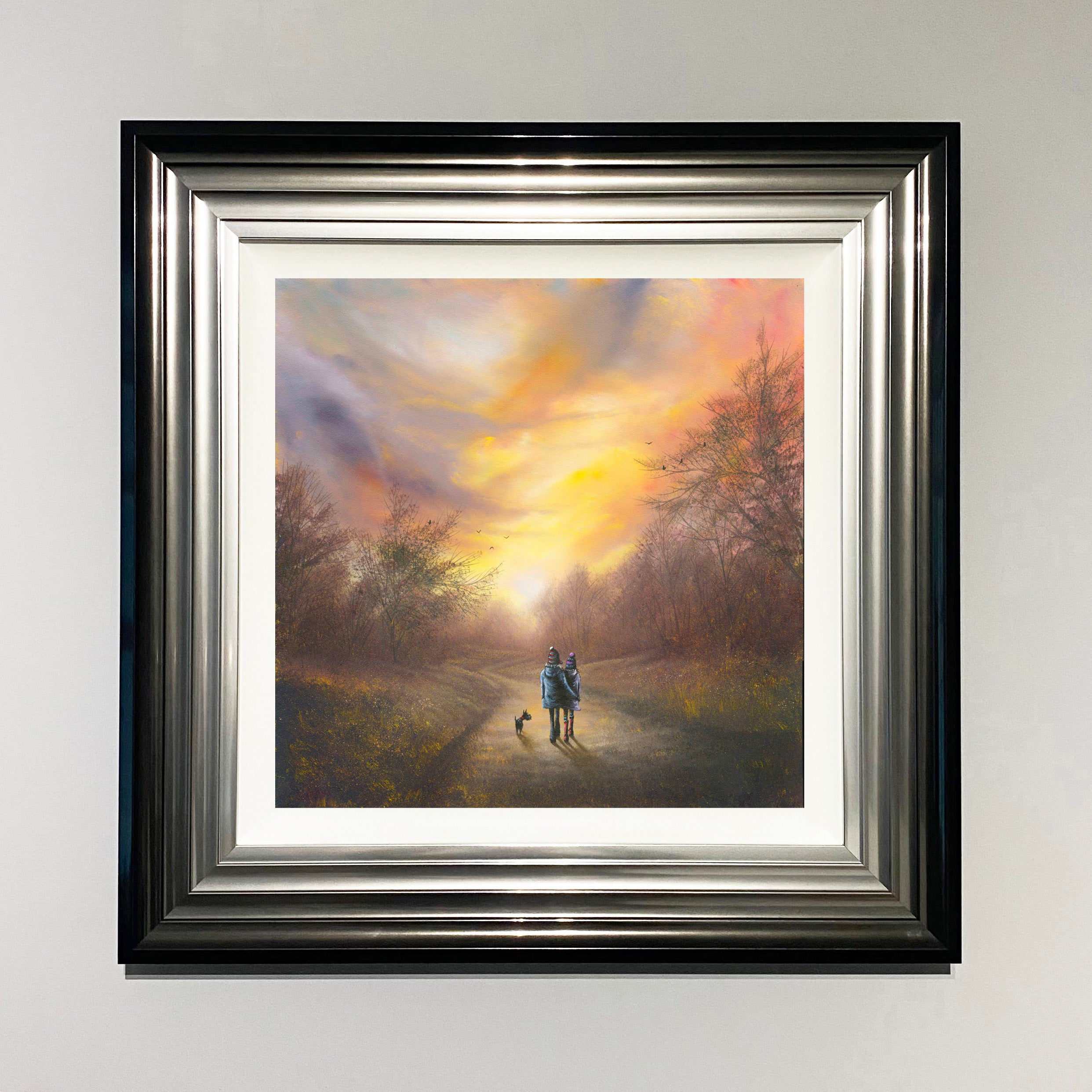 a loving couple take a romantic walk amongst a path surrounded by woodland and nature with birds in the trees. painting by Danny Abrahams Art