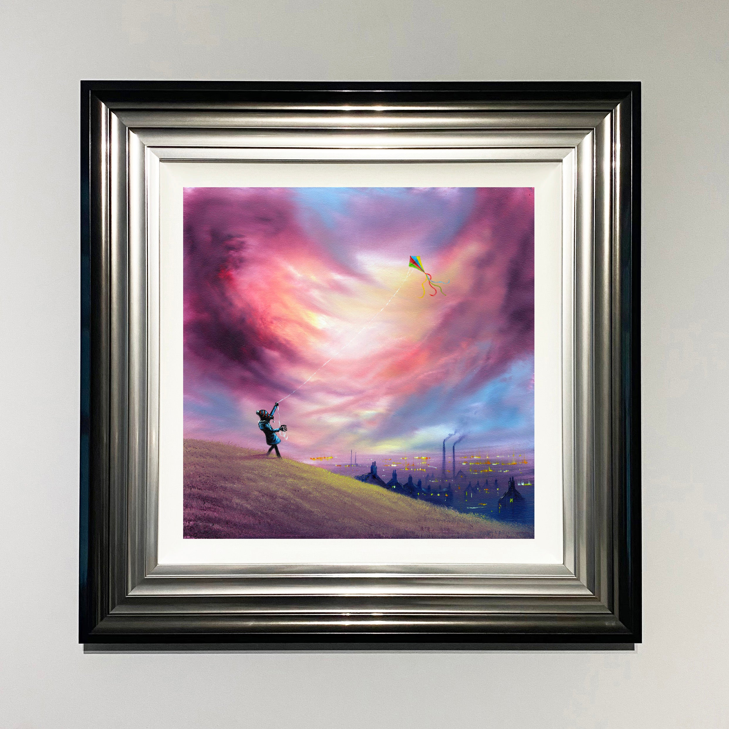 boy flying kite over an industrial landscape with mills and smokey chimneys in the background painting from Danny Abrahams Art. 