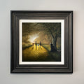 Wizard of Oz inspired landscape painting with Dorothy, Toto, tin man, scarecrow and lion walking the yellow brick road whilst the wicked witch watches from behind a tree by Danny Abrahams Art. 