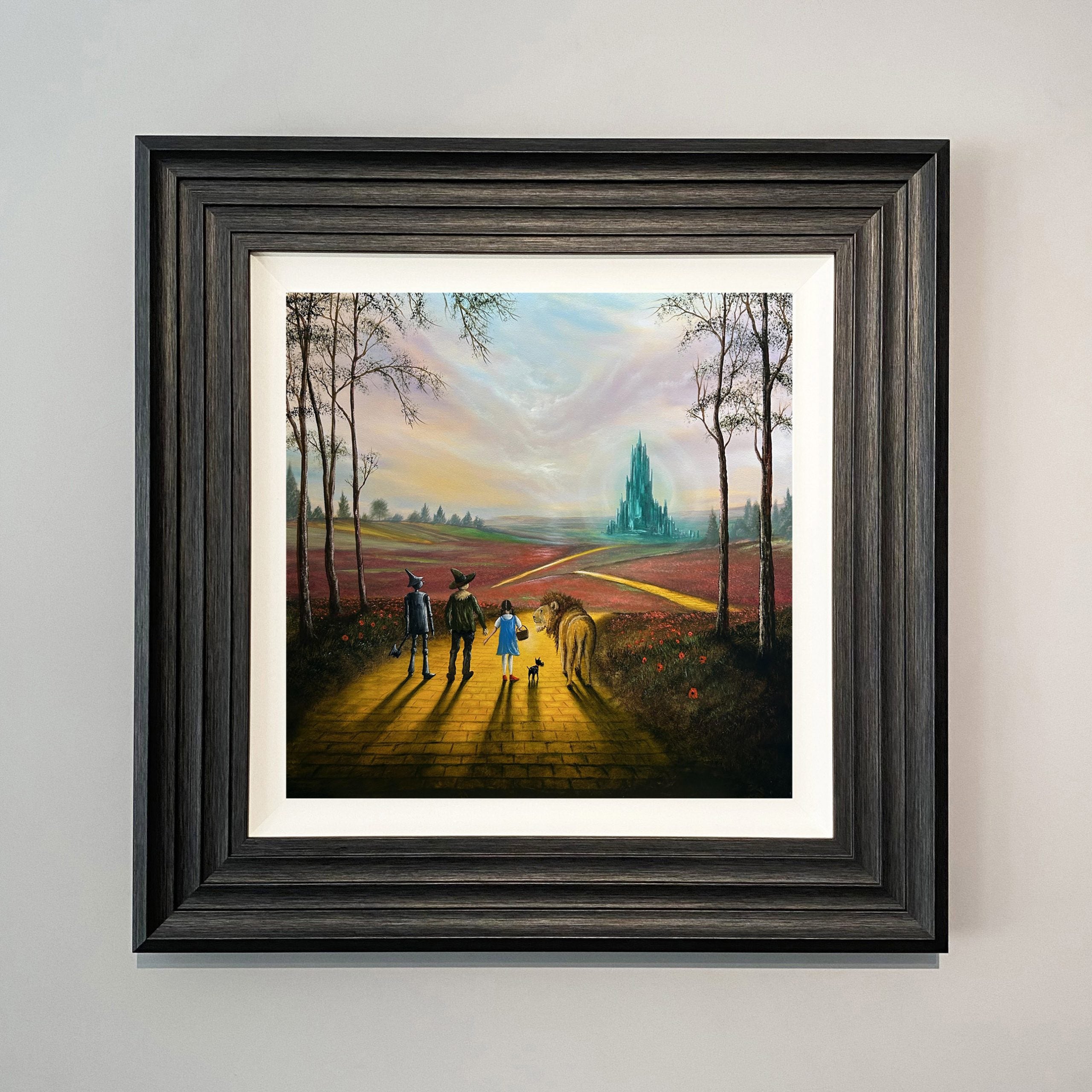 Wizard of Oz inspired yellow brick road painting with Dorothy, Scarecrow, Tin Man and Lion walking towards Emerald City by Danny Abrahams Art 