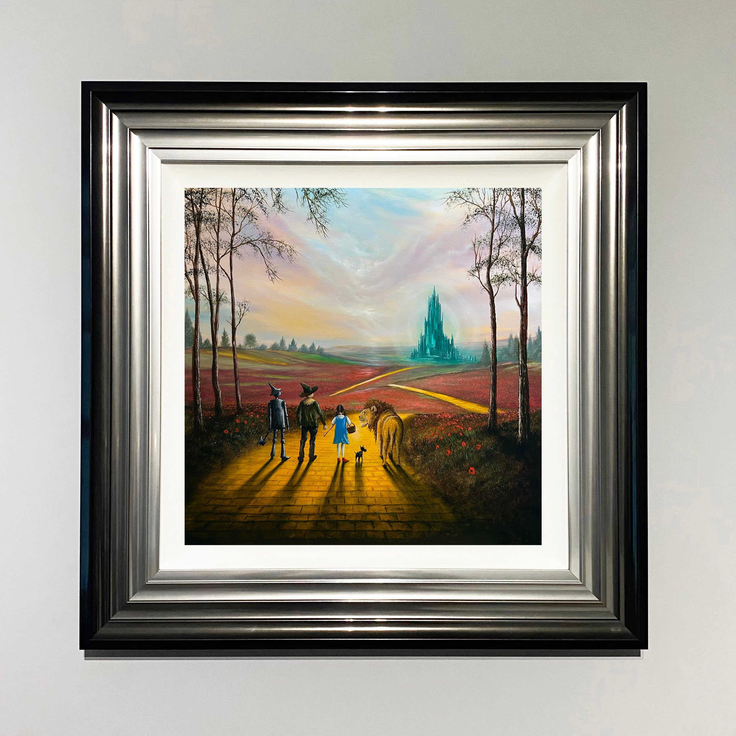 Wizard of Oz inspired yellow brick road painting with Dorothy, Scarecrow, Tin Man and Lion walking towards Emerald City by Danny Abrahams Art 