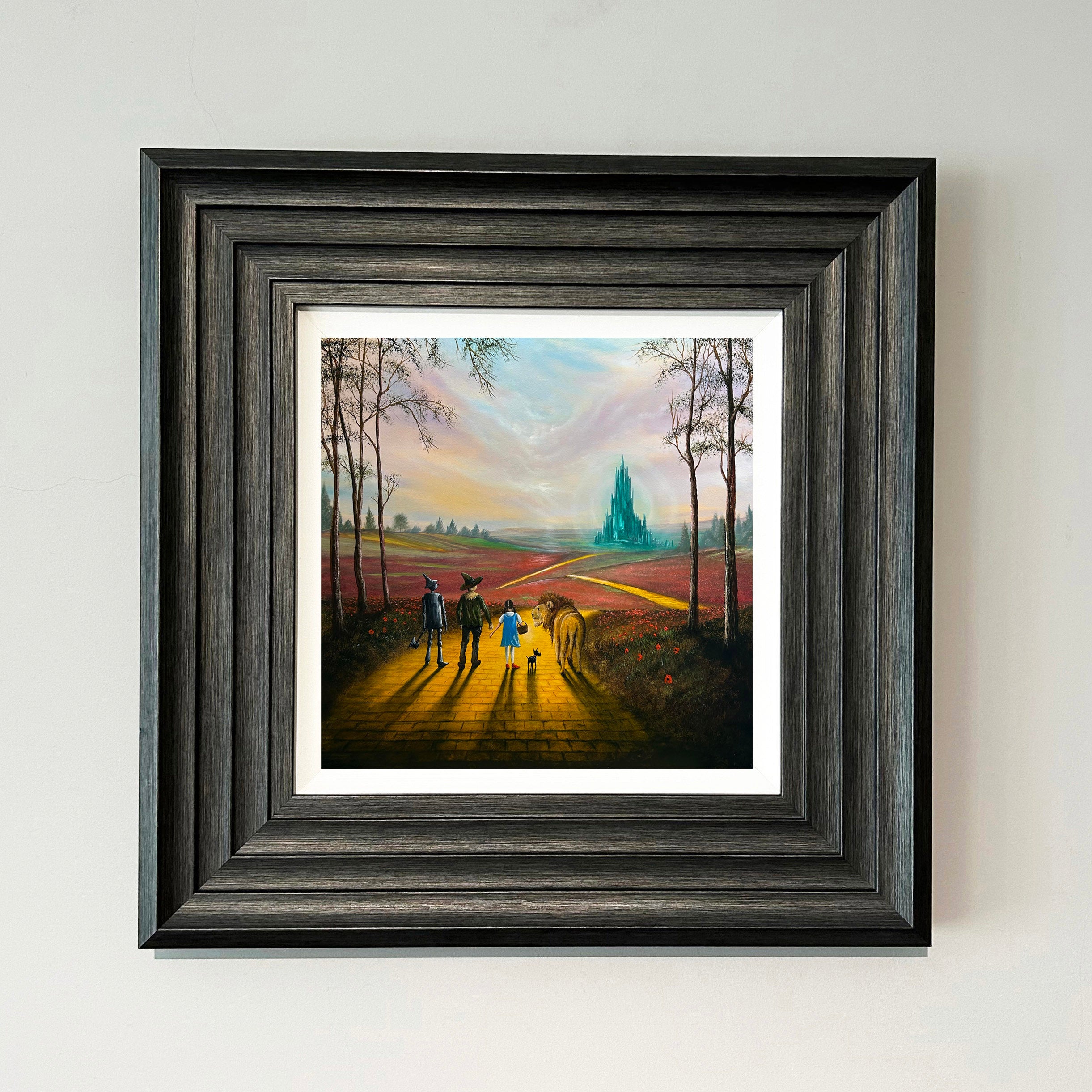 Wizard of Oz inspired yellow brick road painting with Dorothy, Scarecrow, Tin Man and Lion walking towards Emerald City by Danny Abrahams Art 