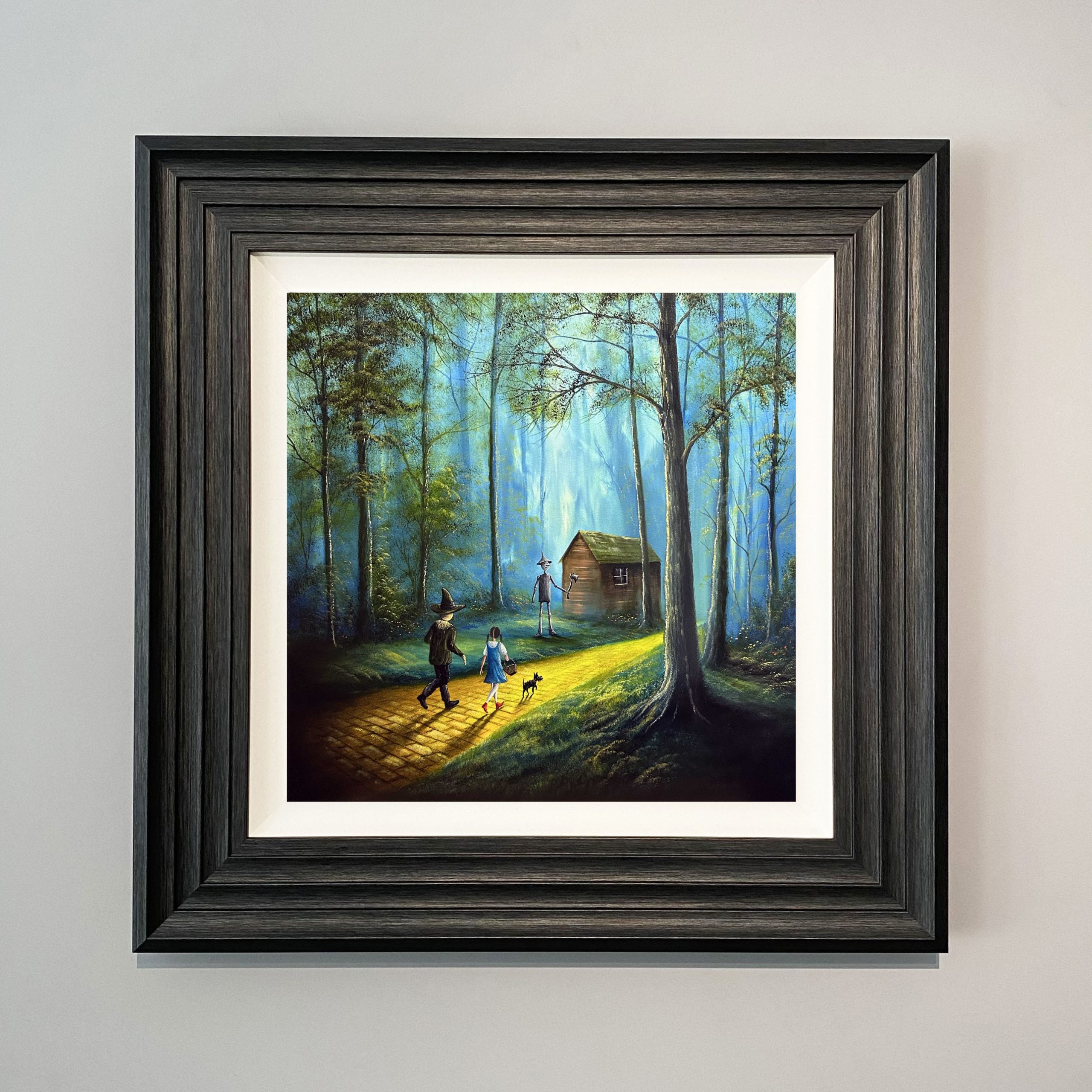 The Heart Of Oz wizard of oz inspired art print with Dorothy and Totowalking along the yellow brick road through a forest by Danny Abrahams