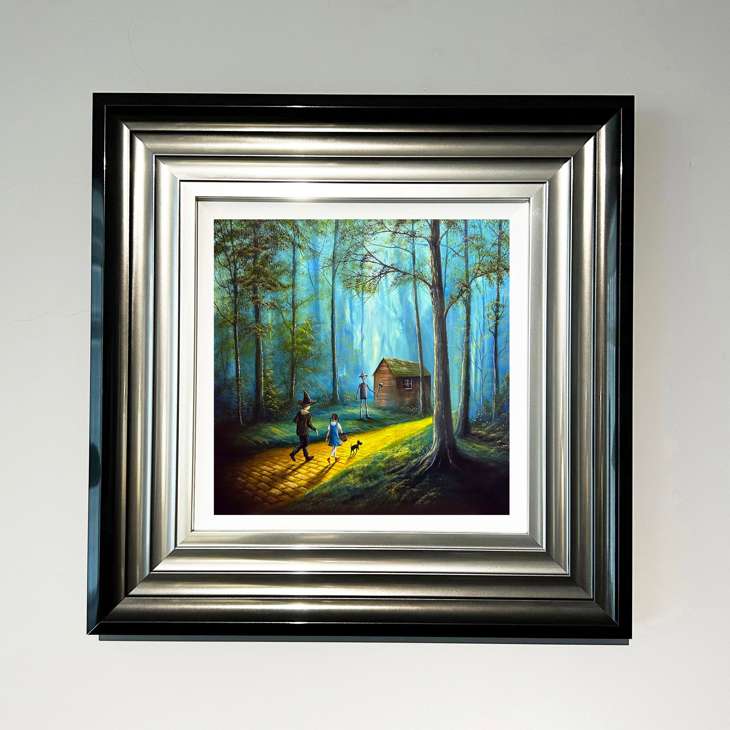 The Heart Of Oz wizard of oz inspired art print with Dorothy and Totowalking along the yellow brick road through a forest by Danny Abrahams